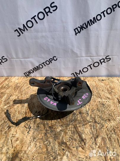 Кулак поворотный левый передний Mitsubishi LancerX