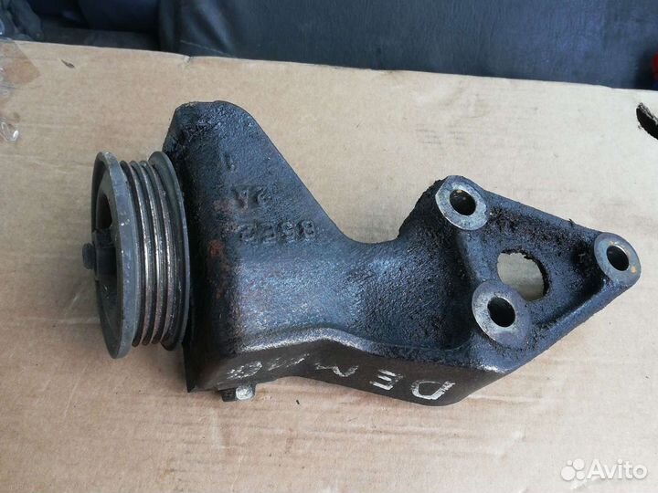 Натяжитель ремня Мазда Демио 1