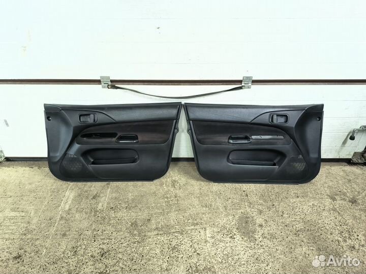 Обшивка двери Mitsubishi Lancer 9