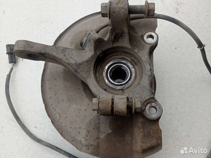 Кулак поворотный передний левый Mitsubishi Lancer