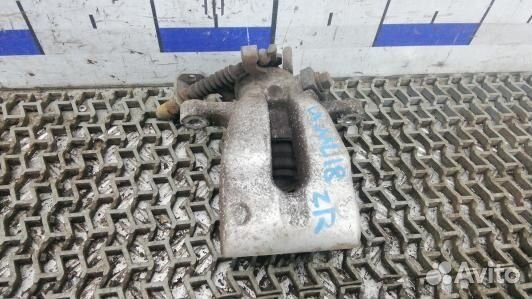 Суппорт тормозной задний правый opel astra H (UML1