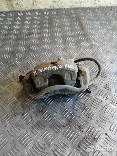 Суппорт тормозной передний правый Hyundai Elantra