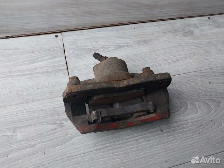 Суппорт передний Kia spectra левый / правый