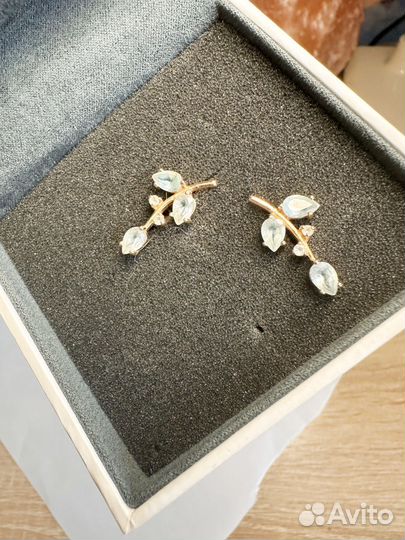 Золотые серьги с топазом