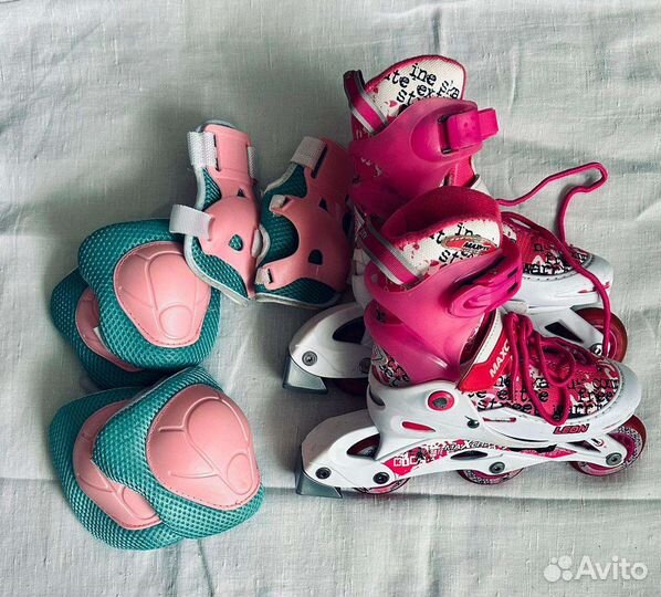 Роликовые коньки