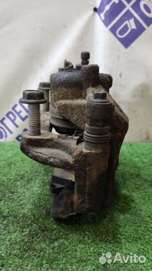 Суппорт передний левый Chevrolet Cruze хэтчбек 1.8