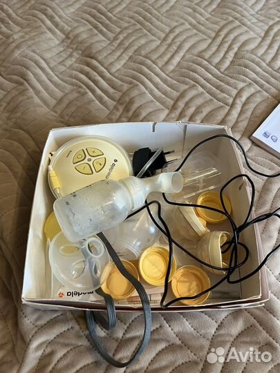 Молокоотсос электрический medela