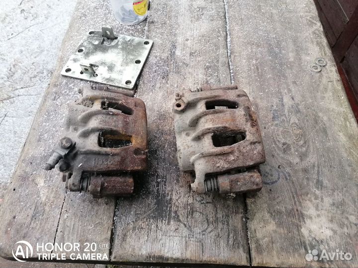Суппорта передние ford transit 2003 цена за оба