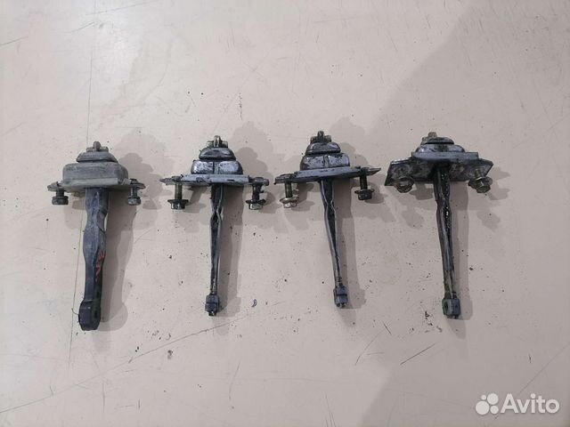 Ограничитель двери Mazda 323 BA