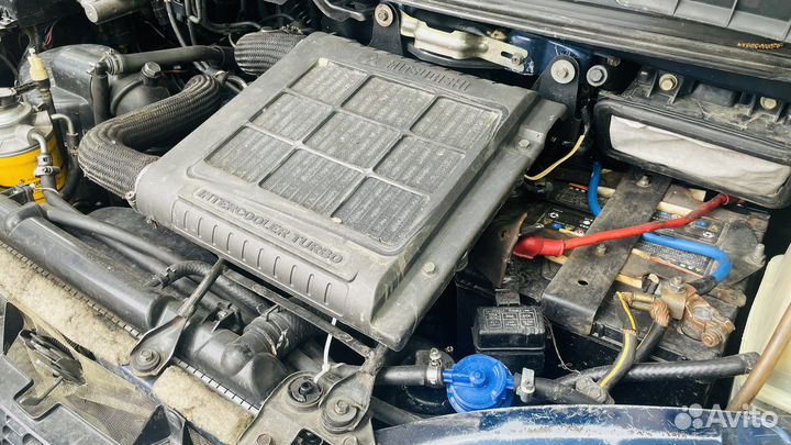 Двигатель и автомат 4M40 EFI турбо