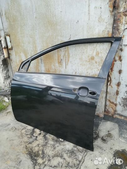 Дверь передняя левая Toyota Corolla E150