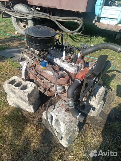 Двигатель газ 52