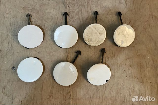 Заглушка бампера Приора под буксирную проушину