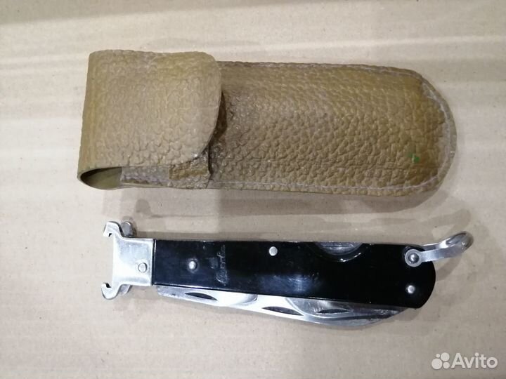 Нож охотника складной с экстракторами для гильз