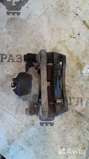 Суппорт передний левый Kia Rio 2000-2005 б/у