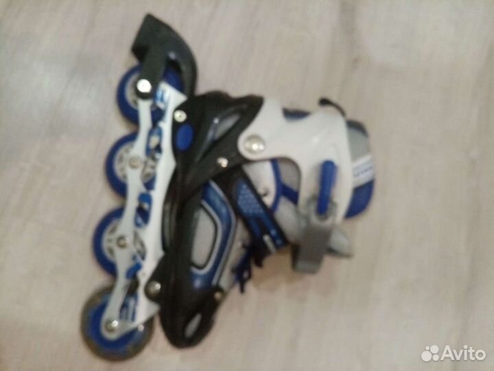 Роликовые коньки