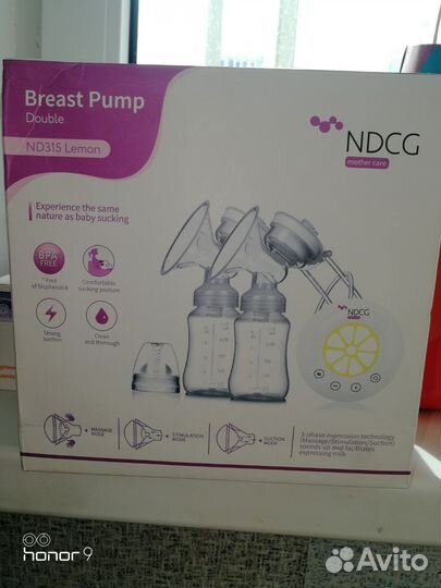Молокоотсос электрический на 2 груди