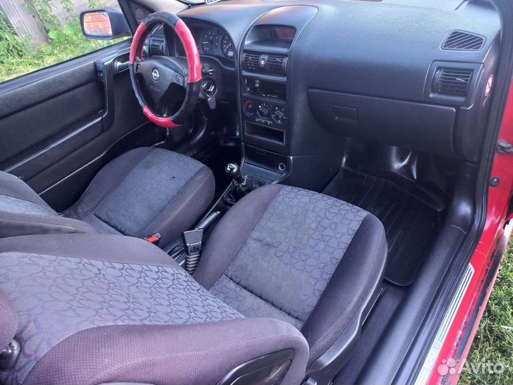 Салон опель астра g