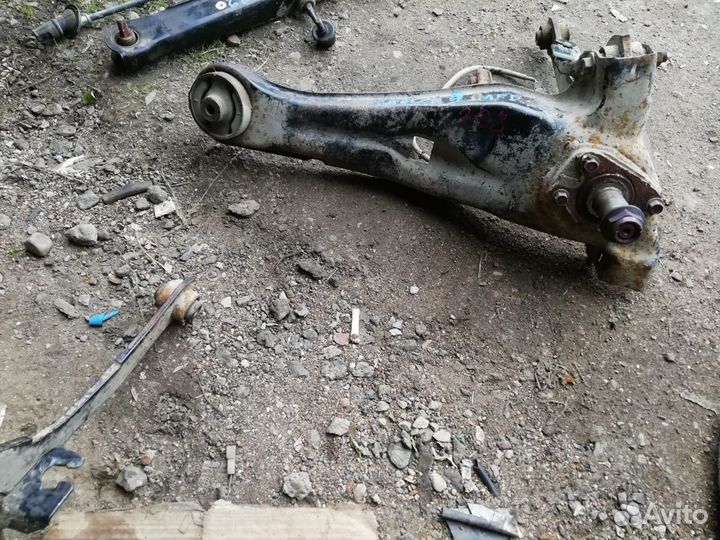 Рычаг задний левый продольный Ланцер 9