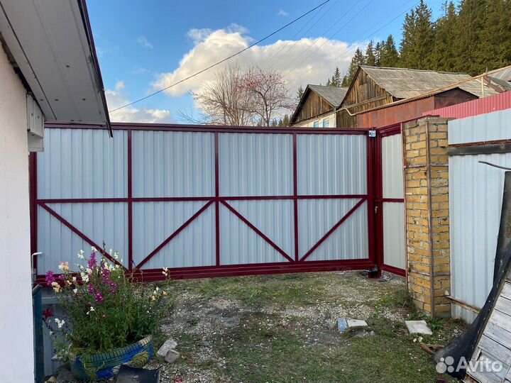 Ворота откатные зимой на винтовых сваях