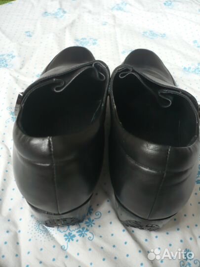 Новые кожаные туфли