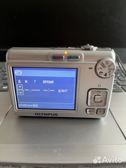 Компактный фотоаппарат olympus FE-210 работает