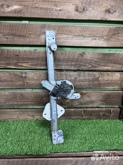 Стеклоподъемник передний левый Рено Логан