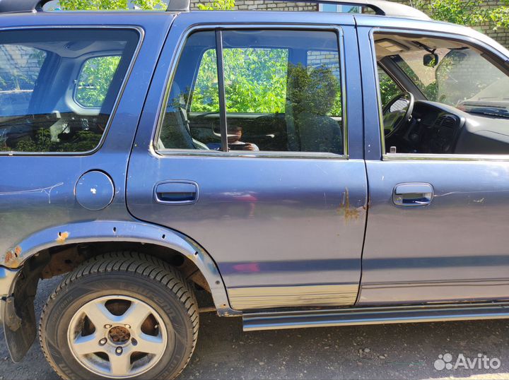 Дверь задняя правая Спортейдж 1