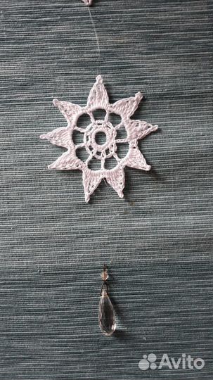 Снежинки связанные крючком на леске.Новый год