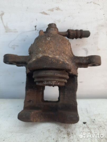 Суппорт тормозной задний левый Hyundai Santa Fe