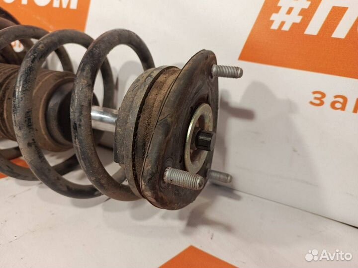 Стойка амортизатора передняя левая Mazda 6