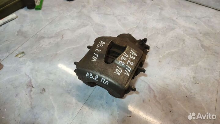 Суппорт передний Volkswagen Golf 4 Bora Skoda Audi