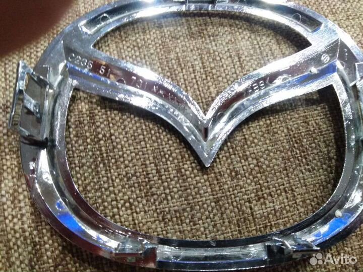Новая Эмблема Оригинал мазда 3