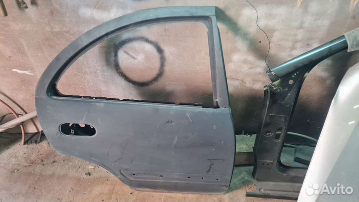 Задняя правая дверь Nissan Almera classic N16