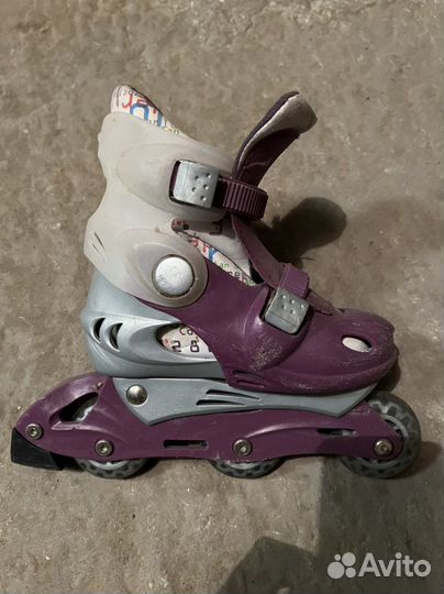 Роликовые коньки