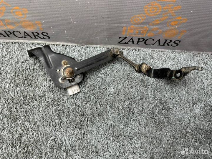 Датчик положения кузова с тягой передний Mazda