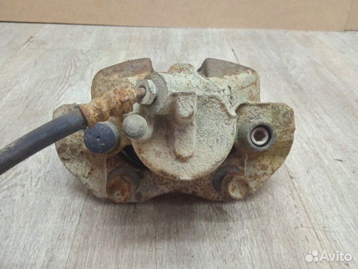 Суппорт передний левый Mazda 3 BL 2010