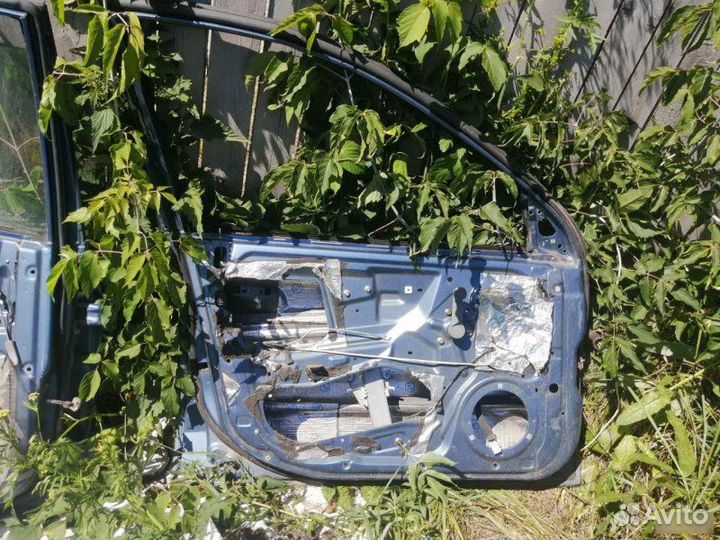 Дверь левая Kia Rio