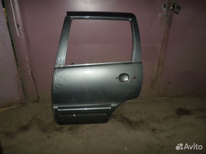 Задняя левая дверь Шевролет Нива