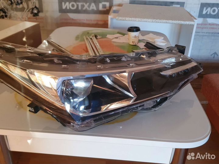 Фара toyota corolla е180