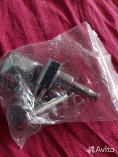 Колок для гитары