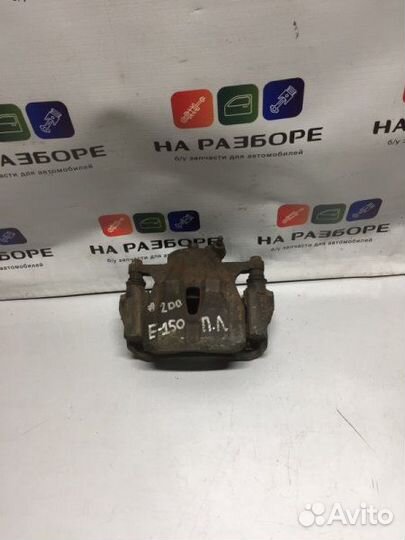 Суппорт передний левый Toyota Corolla E150