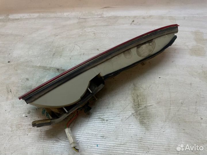 Фонарь в крышку багажнка задний левый Bmw 7-Series