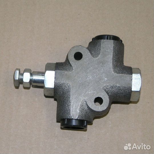 Клапан ограничительный опрокидывающего механизма с