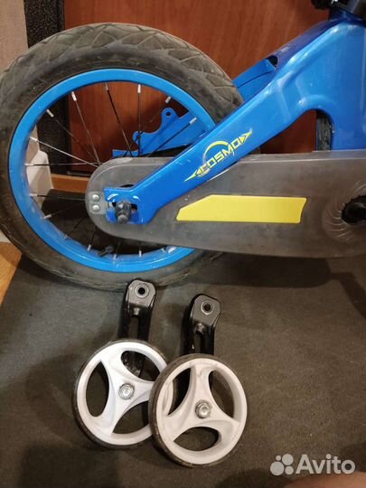 Четырёхколёсный детский велосипед