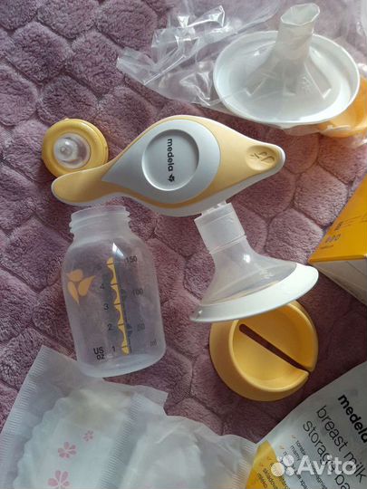 Молокоотсос ручной medela