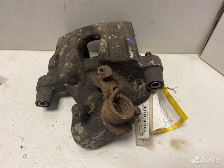 Суппорт тормозной задний левый Ford Focus Ii