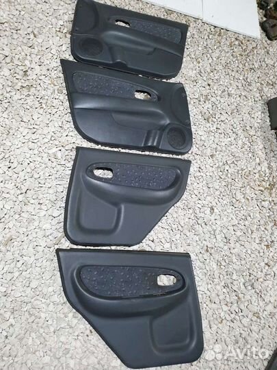 Обшивка двери Киа Спектра Kia Spectra