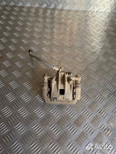 Суппорт тормозной задний правый Hyundai Elantra HD