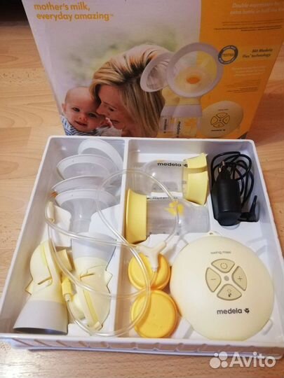 Молокоотсос medela swing электрический